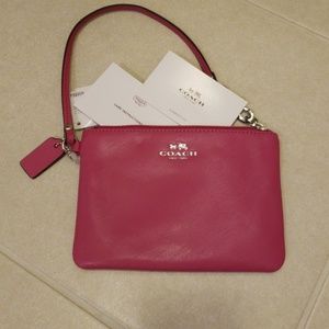 Pink Coach wristlet